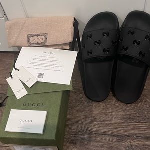 Authentic Gucci rubber GG slide sandal.